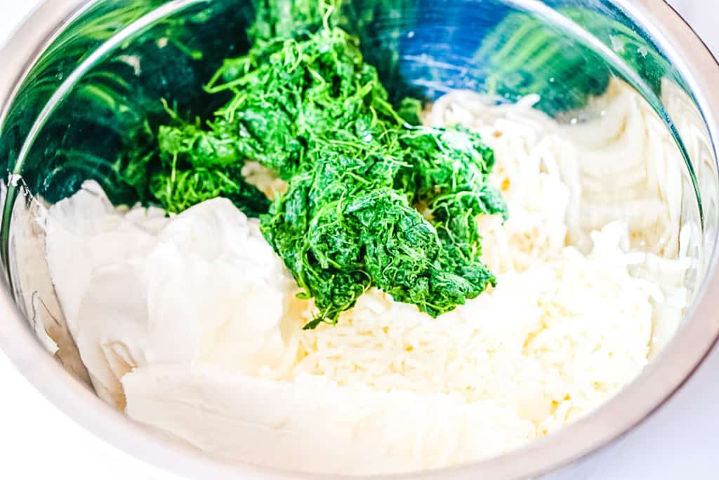 keto spinach dip ingredients in a mixing bowl