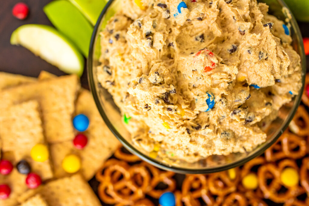 cookie dough dip with peanut butter, chocolate chips, m&m's and oats