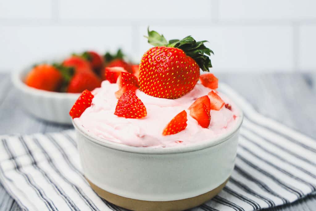 strawberry fruit dip finished with fresh strawberry on top ready to serve