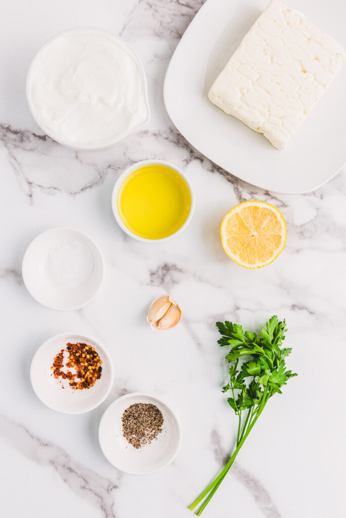 ingredients on a table for whipped feta dip