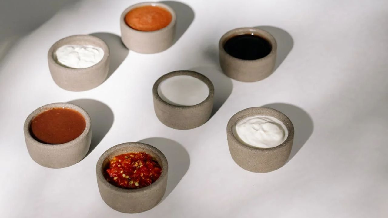 Assorted sauces in gray bowls