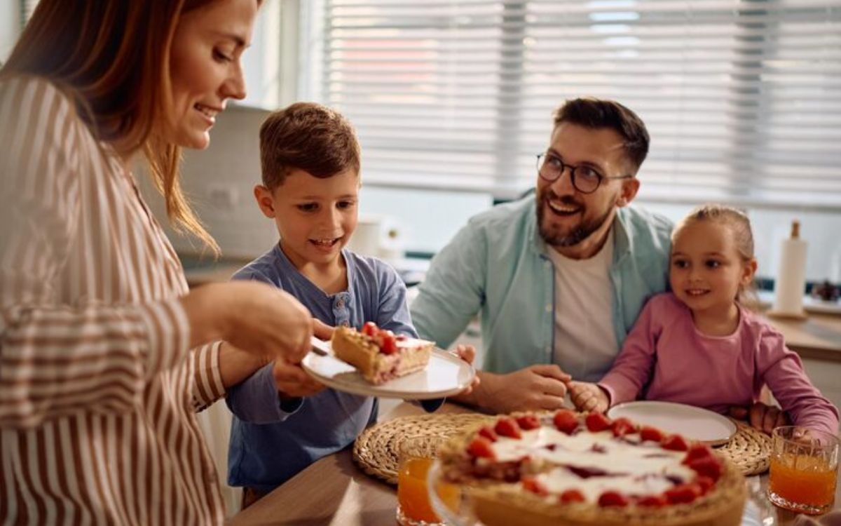 Family enjoying dessert together at the dining table