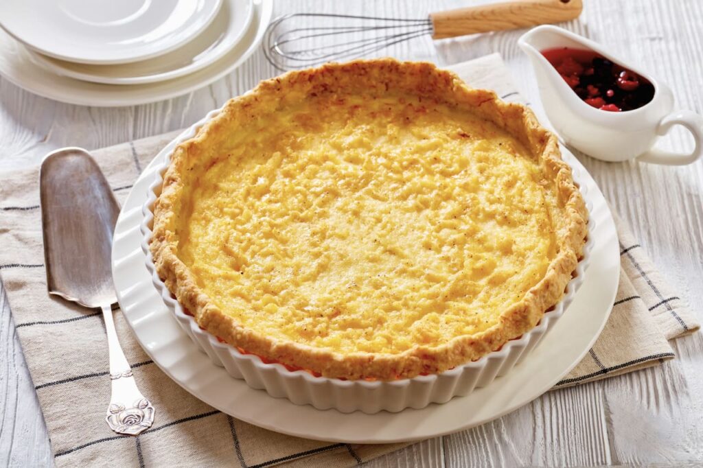close-up of Classic chess pie pairs a traditional butter pie crust with a sweet, custardy filling in white baking dish, american cuisine,