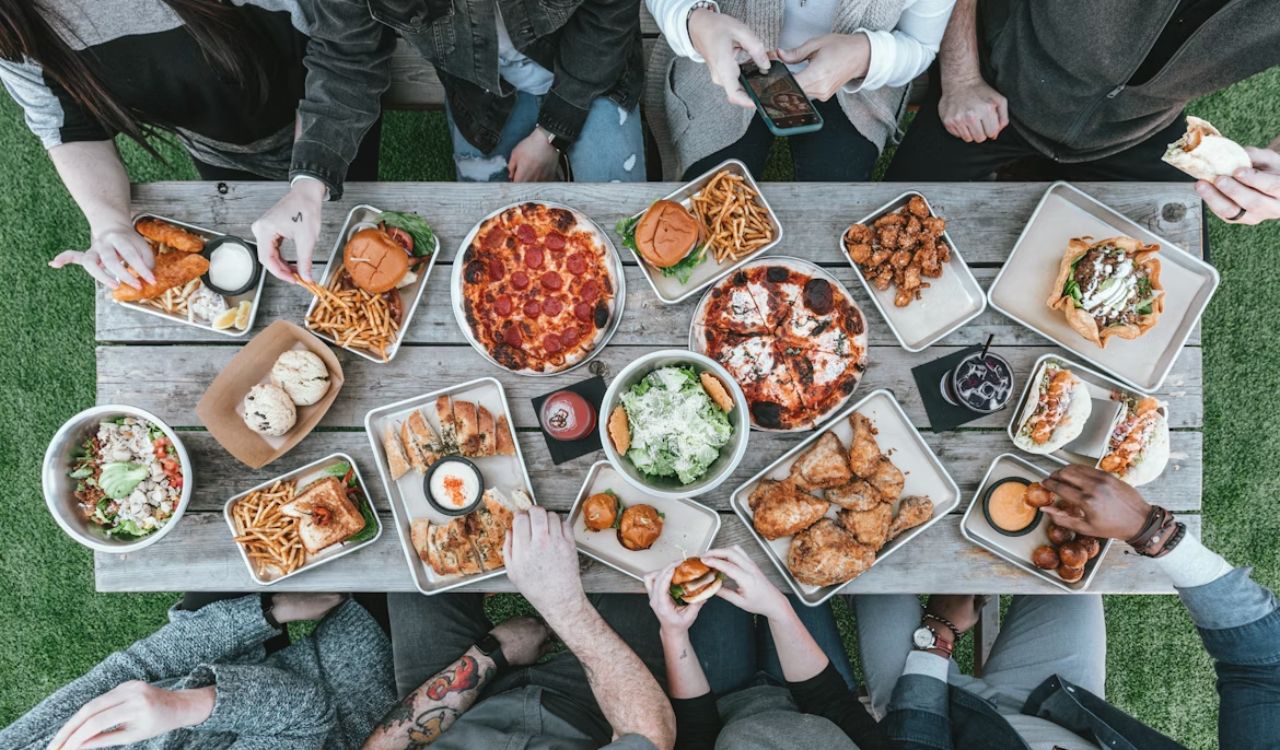A group of people sitting around a table