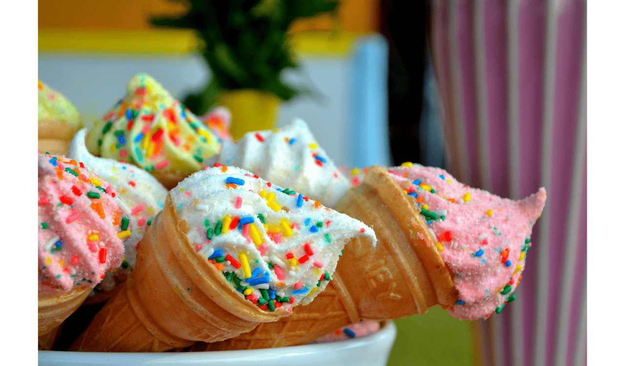 Brown Cone With White Sprinkled Icing