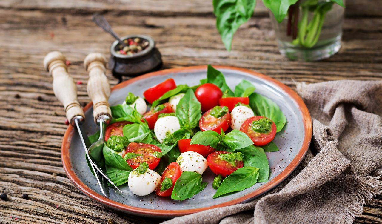 Caprese salad. healthy meal with cherry tomatoes, mozzarella balls