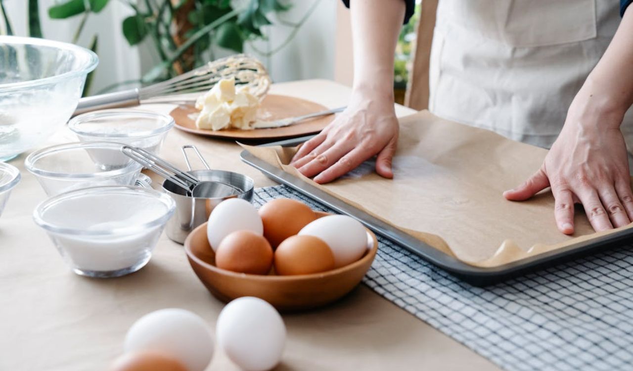 Close-Up Shot of a Person Preparing Her Baking Equipment