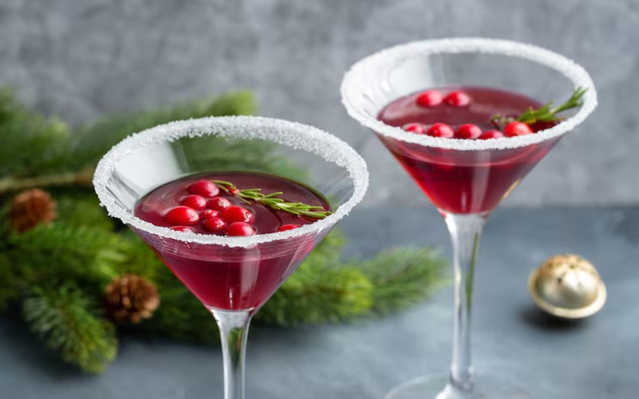 Cranberry margaritas with sugared rims and rosemary