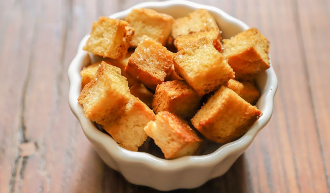 Croutons on white bowl