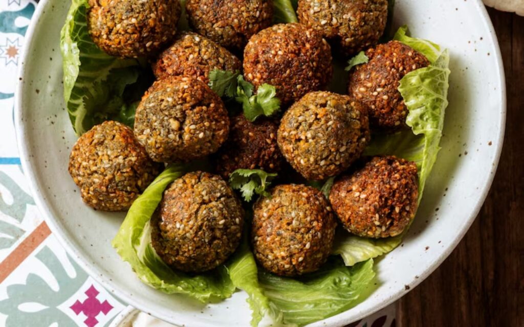 Falafel balls on a bed of lettuce