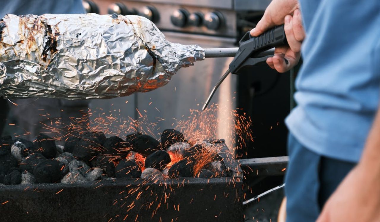 Person Burning BBQ Charcoal