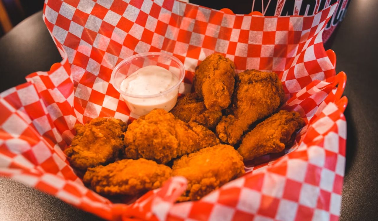 Fried chicken on white ceramic plate