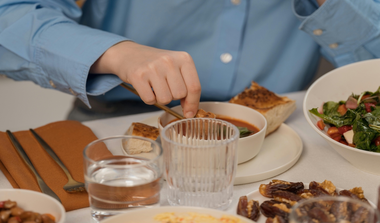 Man Eating Soup During Dinner