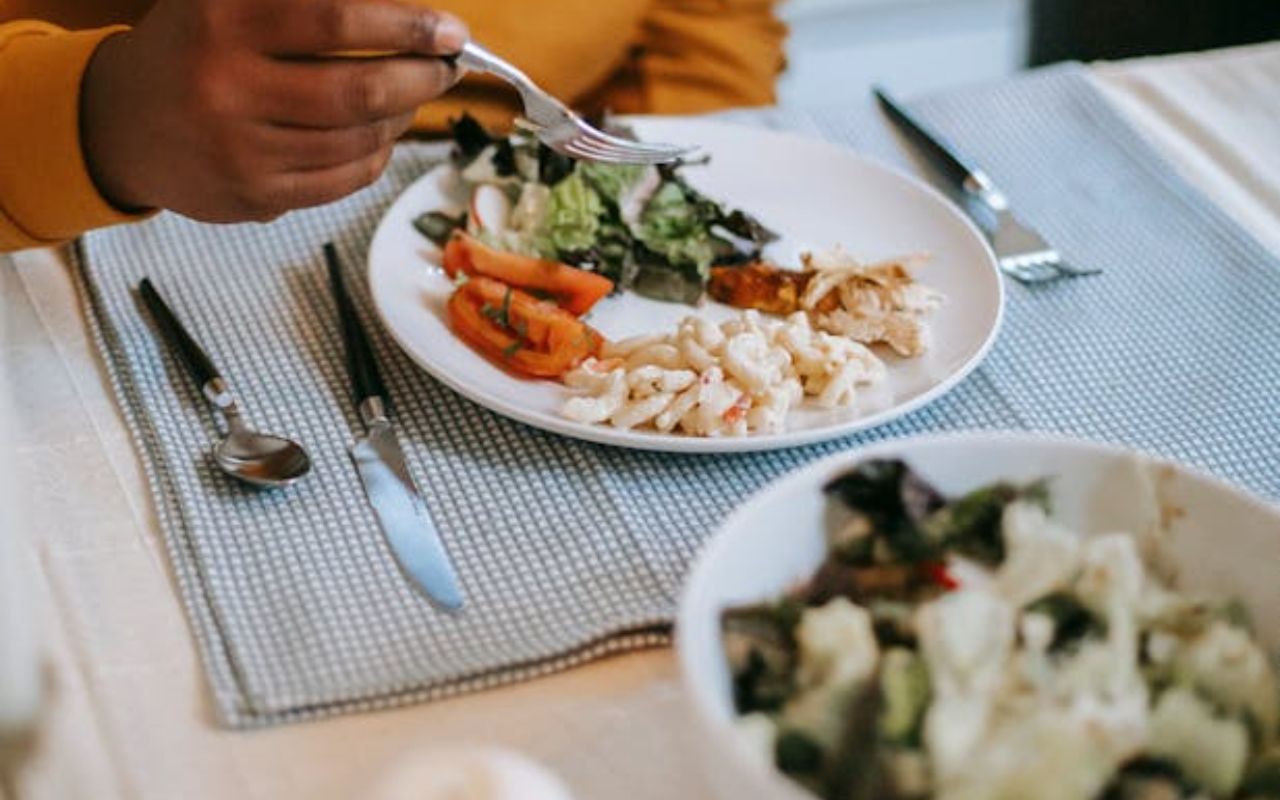 Plate of Hawaiian macaroni salad with greens