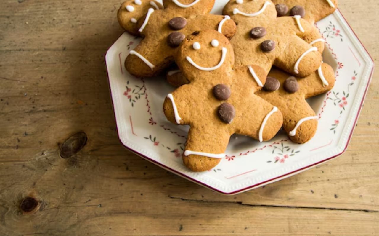 Gingerbread cookies with icing and chocolate buttons