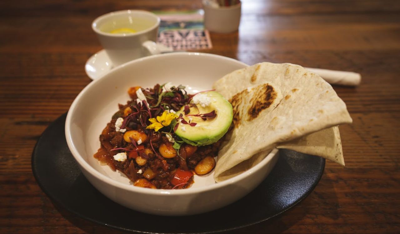 Hearty Mexican Chili with Tortilla and Avocado