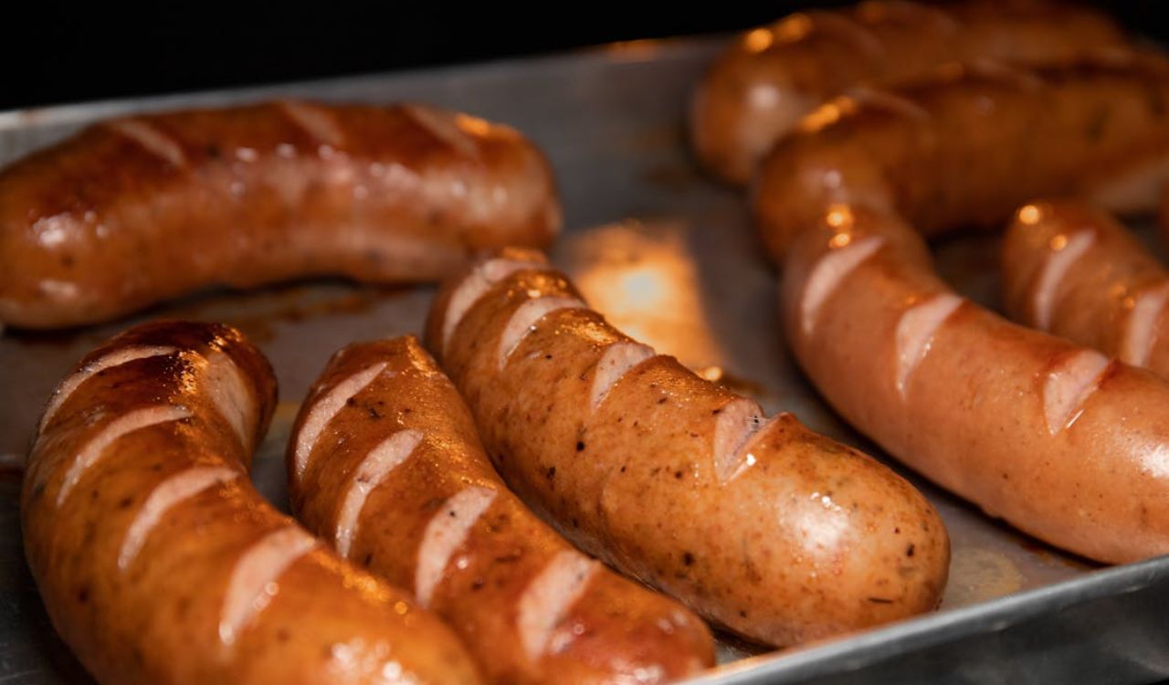 Hotdogs on a metal tray