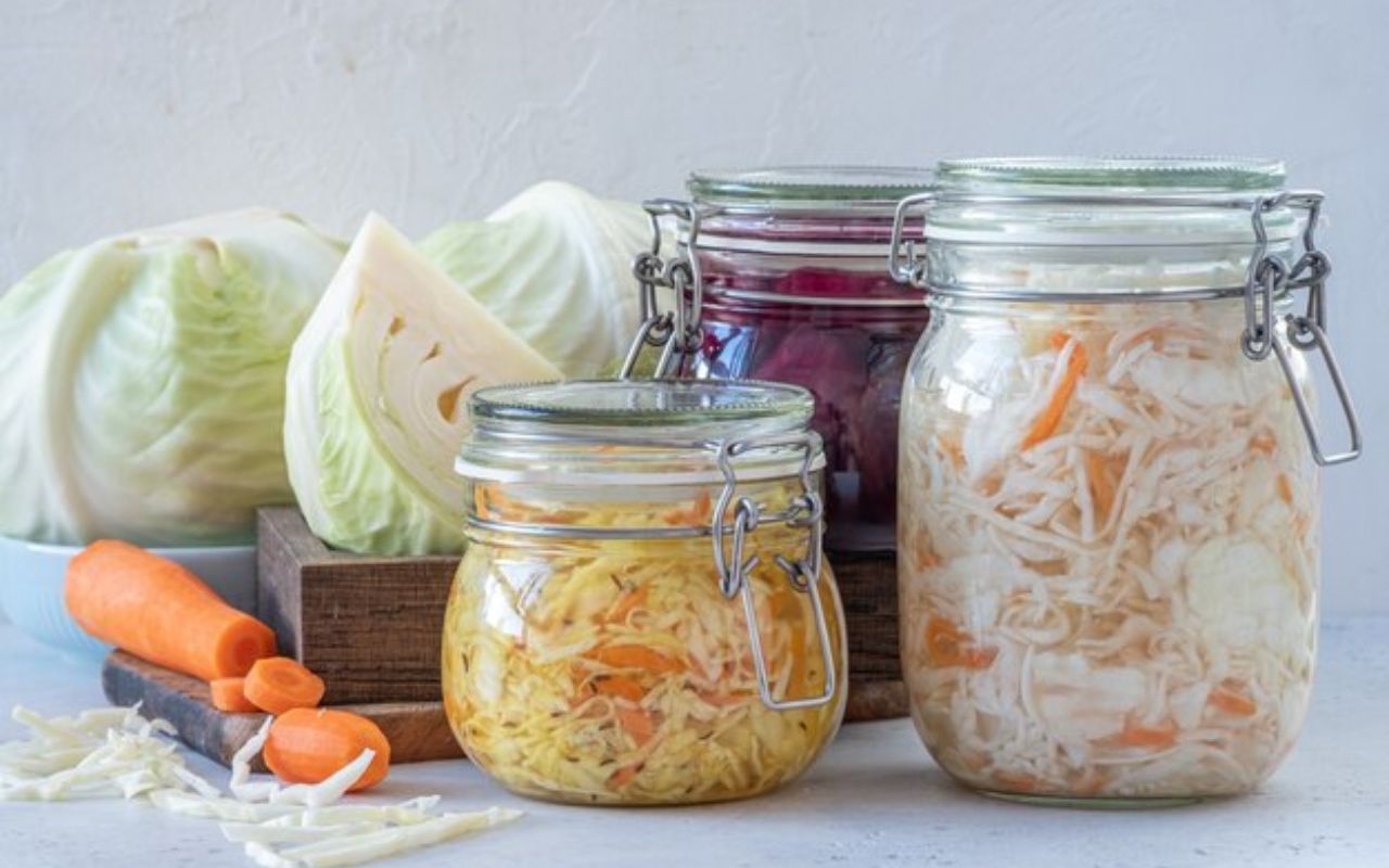 Jars of sauerkraut with cabbage and carrots