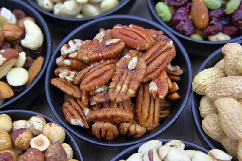 Assorted Nuts in Bowls Display for Snacks