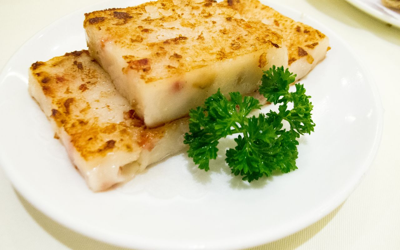 Pan-fried turnip cake slices with parsley