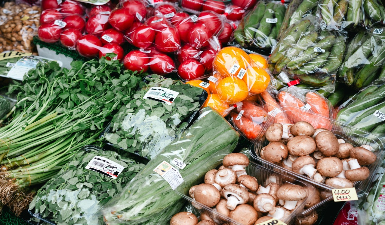 A display of vegetables and fruits at a market