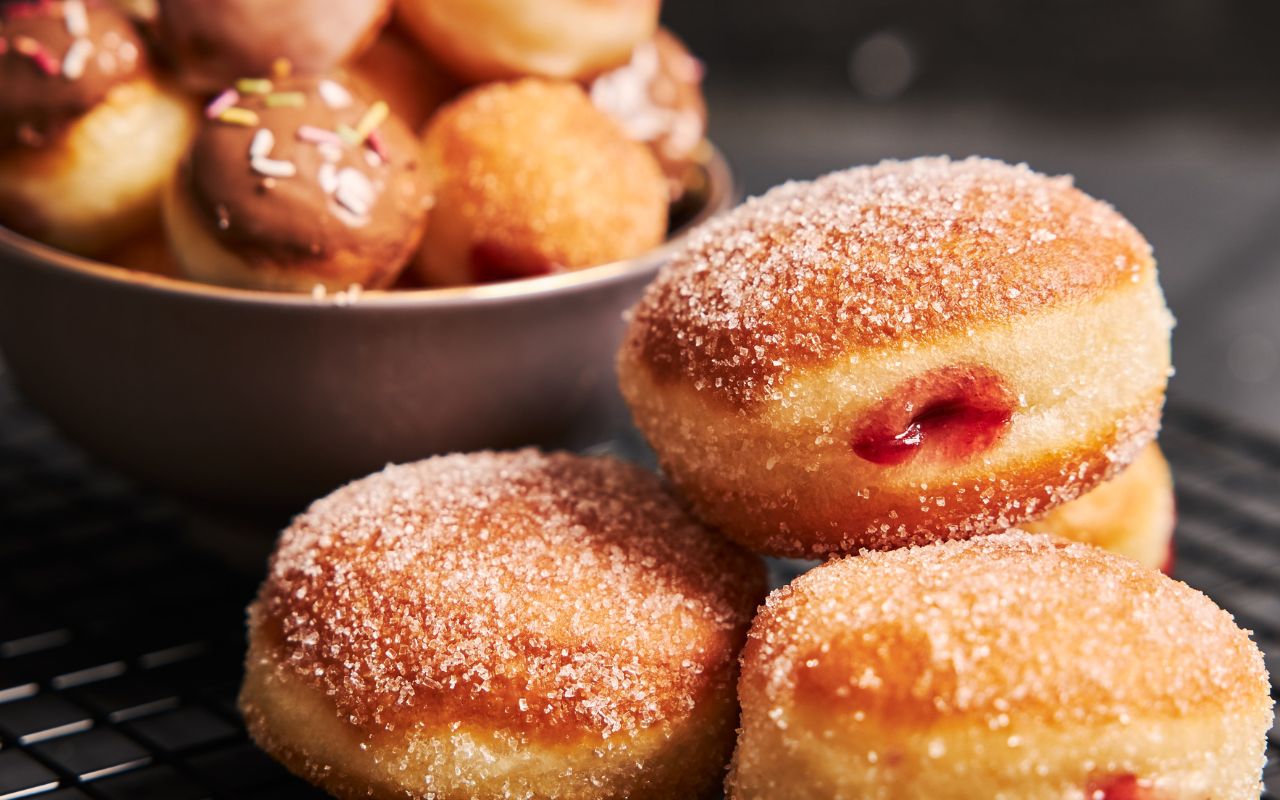 Jelly-filled doughnuts with sugar coating