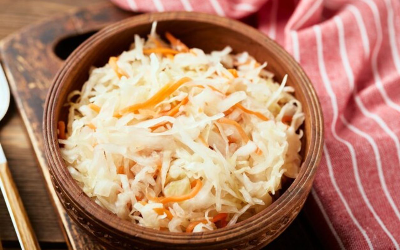 Bowl of sauerkraut with shredded carrots