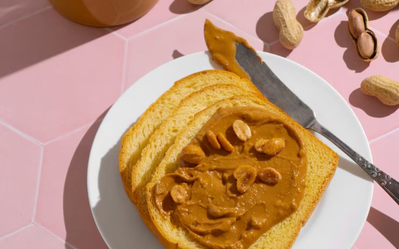 Toast with peanut butter on plate