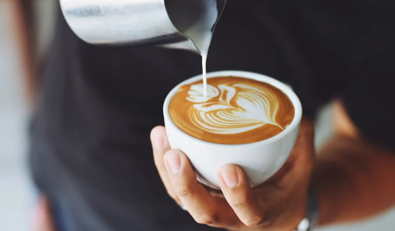 Person Performing Coffee Art