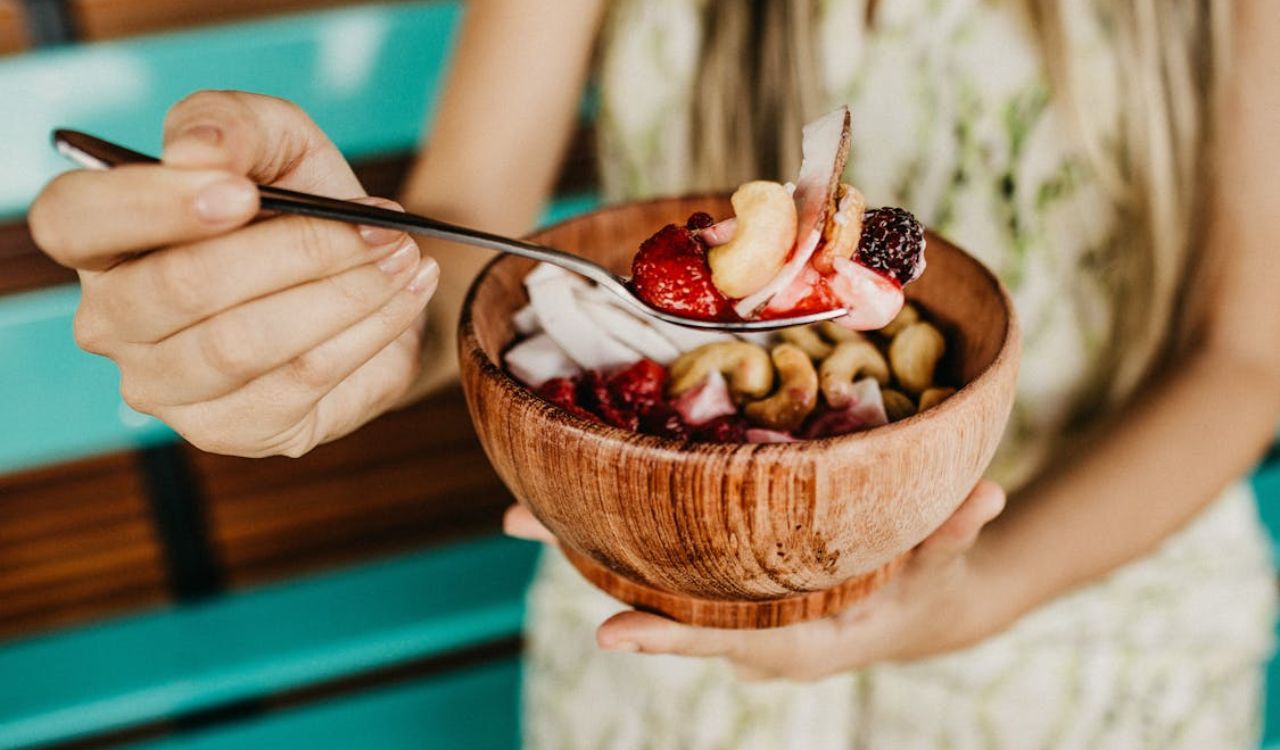 Person holding breakfast bowl