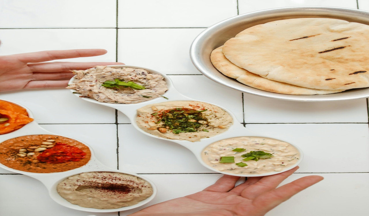 Overhead Shot of Pita Bread Near Dips