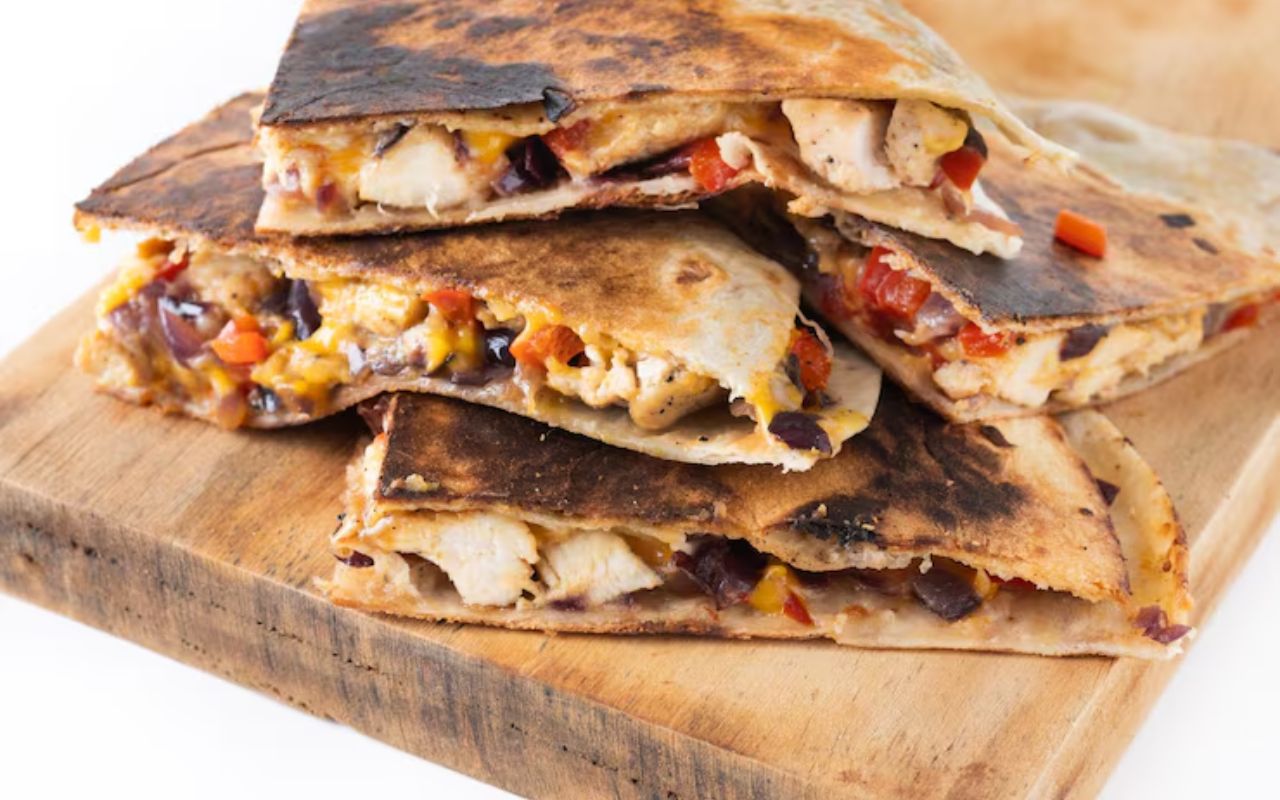Stack of cheesy chicken quesadillas
