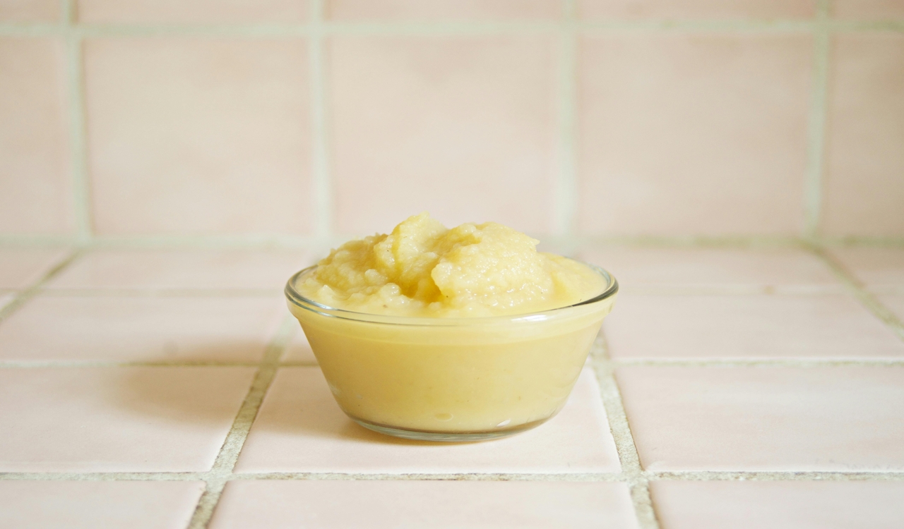 Yellow Baby Food in Ceramic Bowl