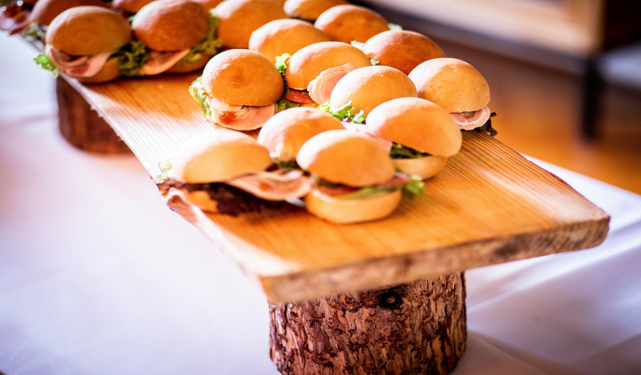 Mini-Burgeres on Brown Wooden Chopping Board