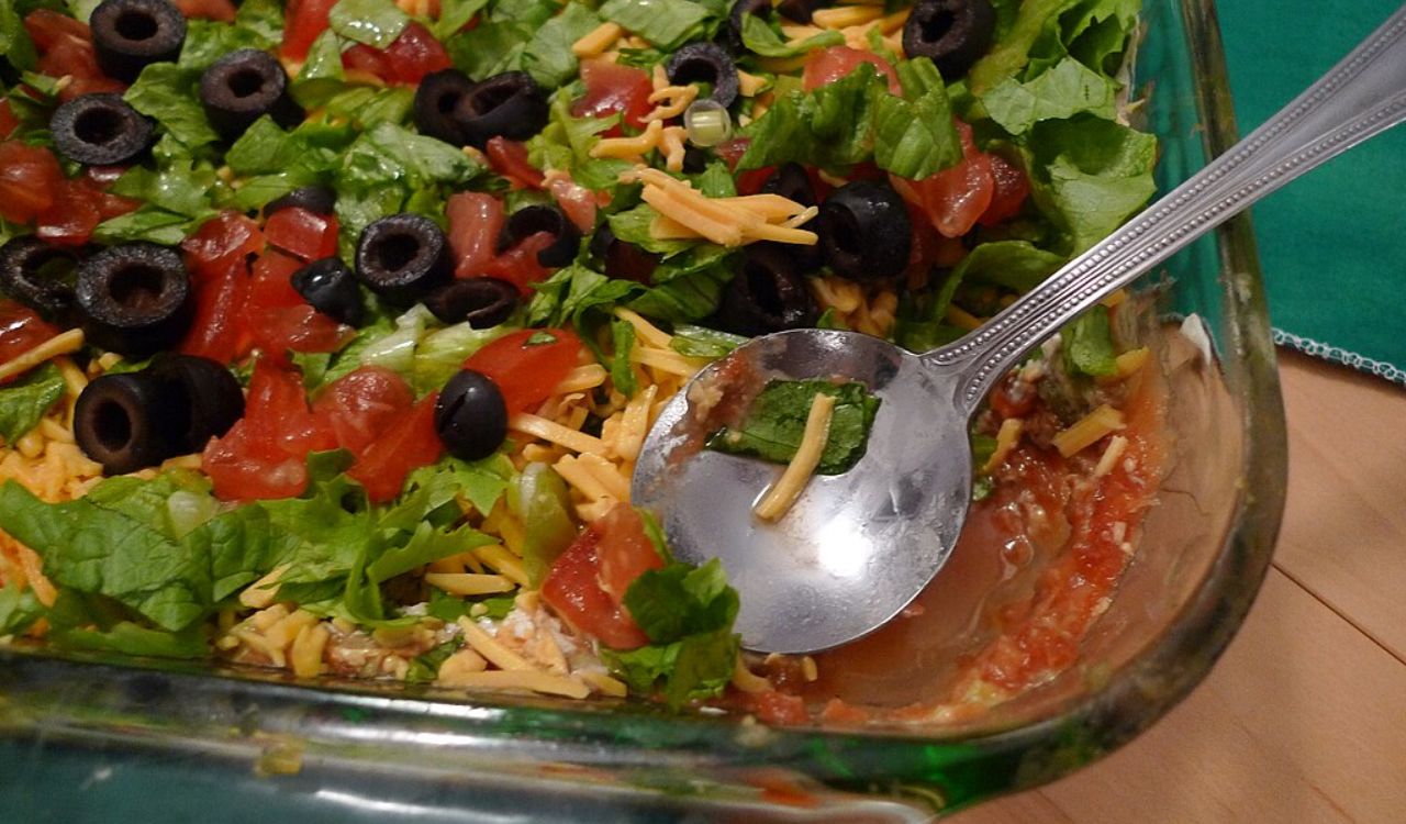 Seven layer dip is the name of an American appetizer based on common ingredients in Tex-Mex cuisine.