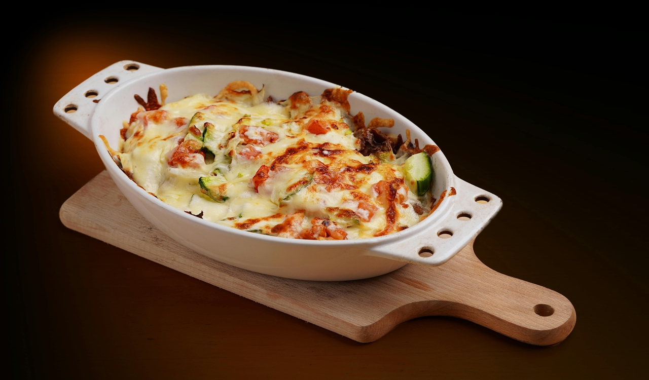 Cheesy Vegetable Baked Casserole in White Dish