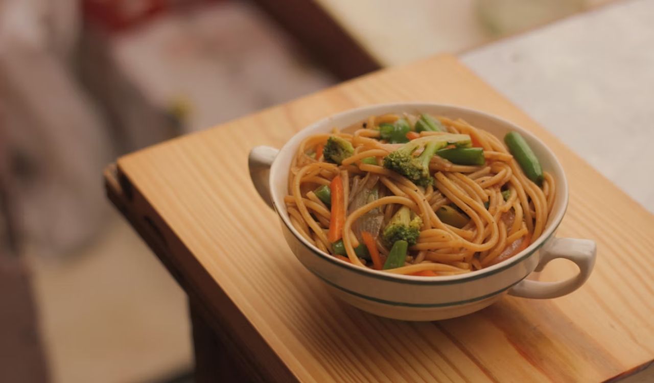 White ceramic bowl with egg noodles