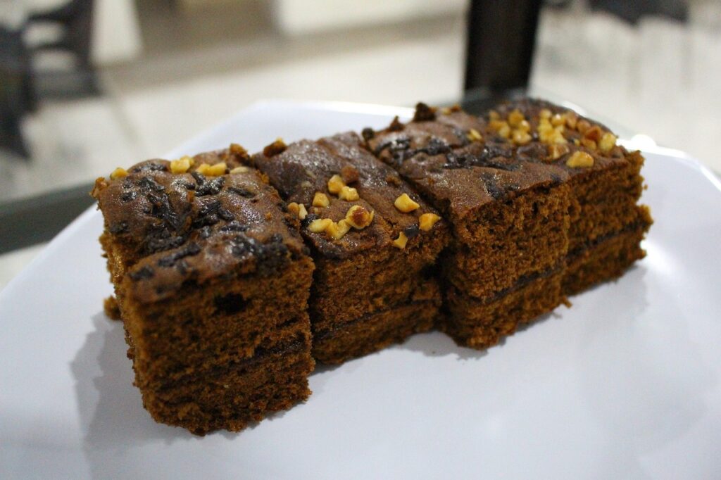 nuts spread on top of brownies