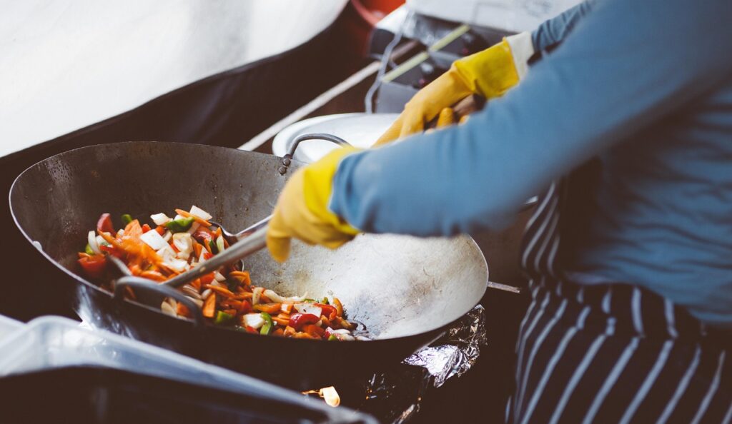 Stir-fry in a wok with an array of colorful vegetables