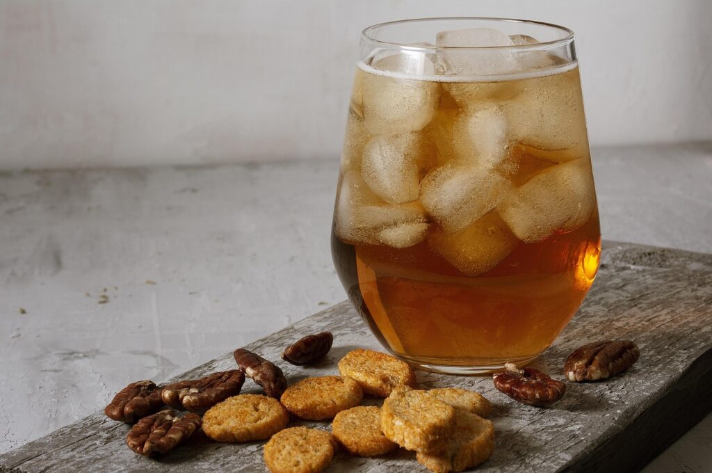 Glass of bourbon with ice