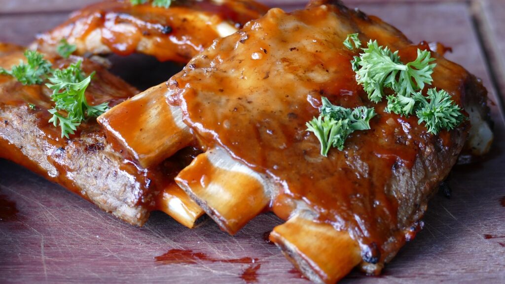 BBQ ribs brushed with peanut butter-infused sauce.