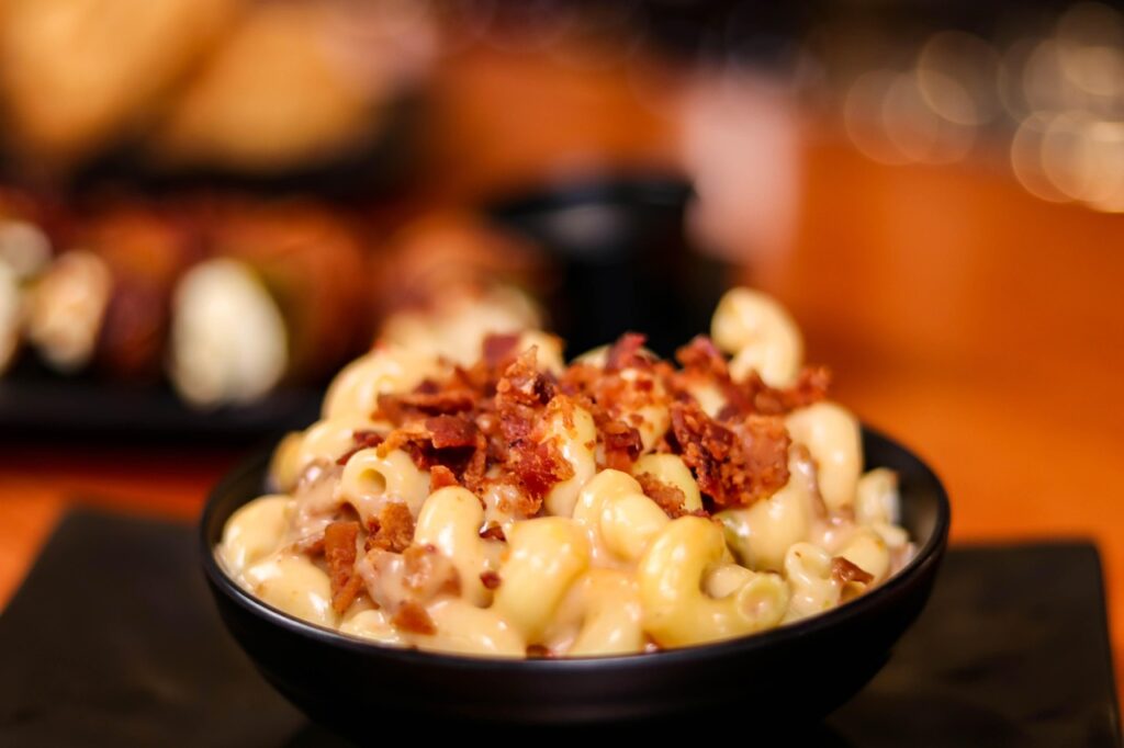 Creamy baked mac and cheese in a rustic dish.