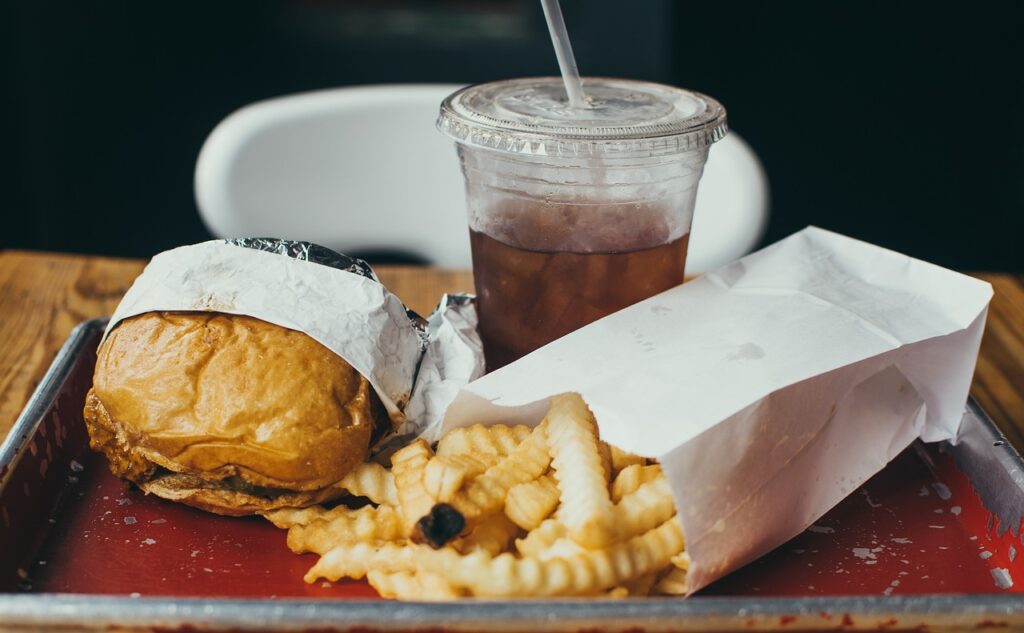 A burger, fries, and shake trio.
