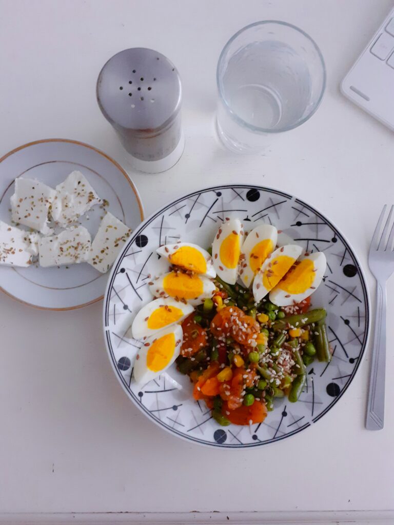 Warm Grain Bowl with Eggs and Greens