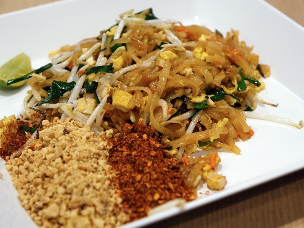 Stir-fried vegetables coated in peanut sauce.