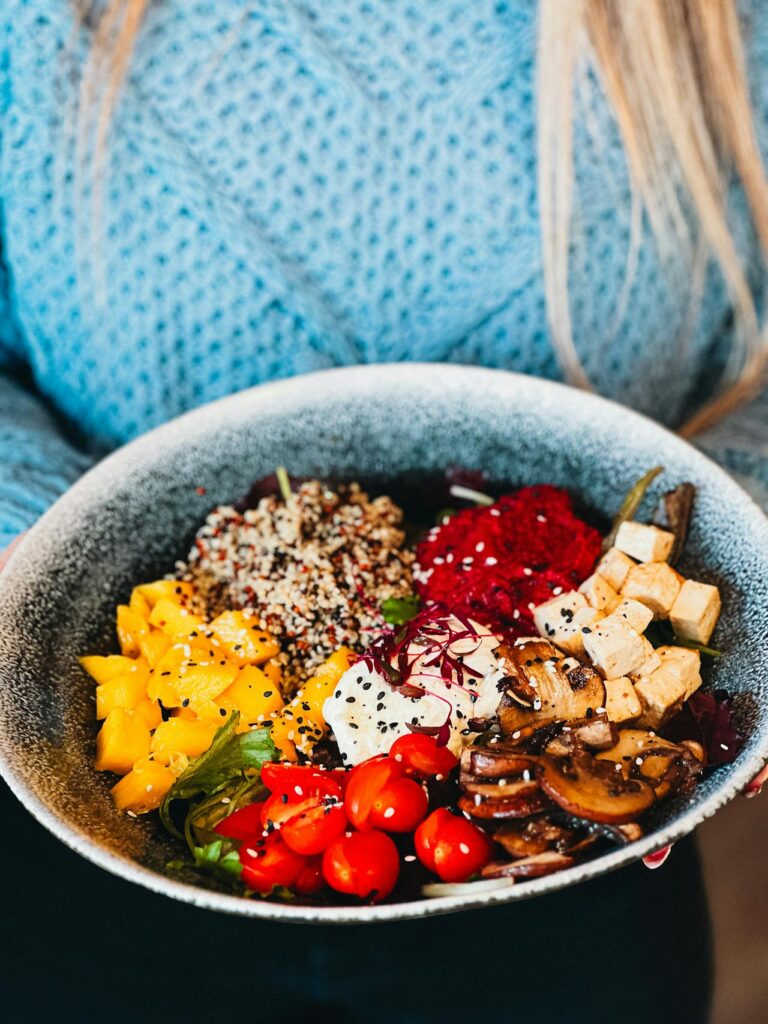 Cherries mixed into a bowl of fiber-rich oatmeal.