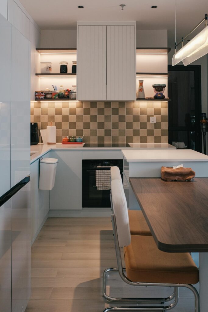 Compact air fryer in a small apartment kitchen.