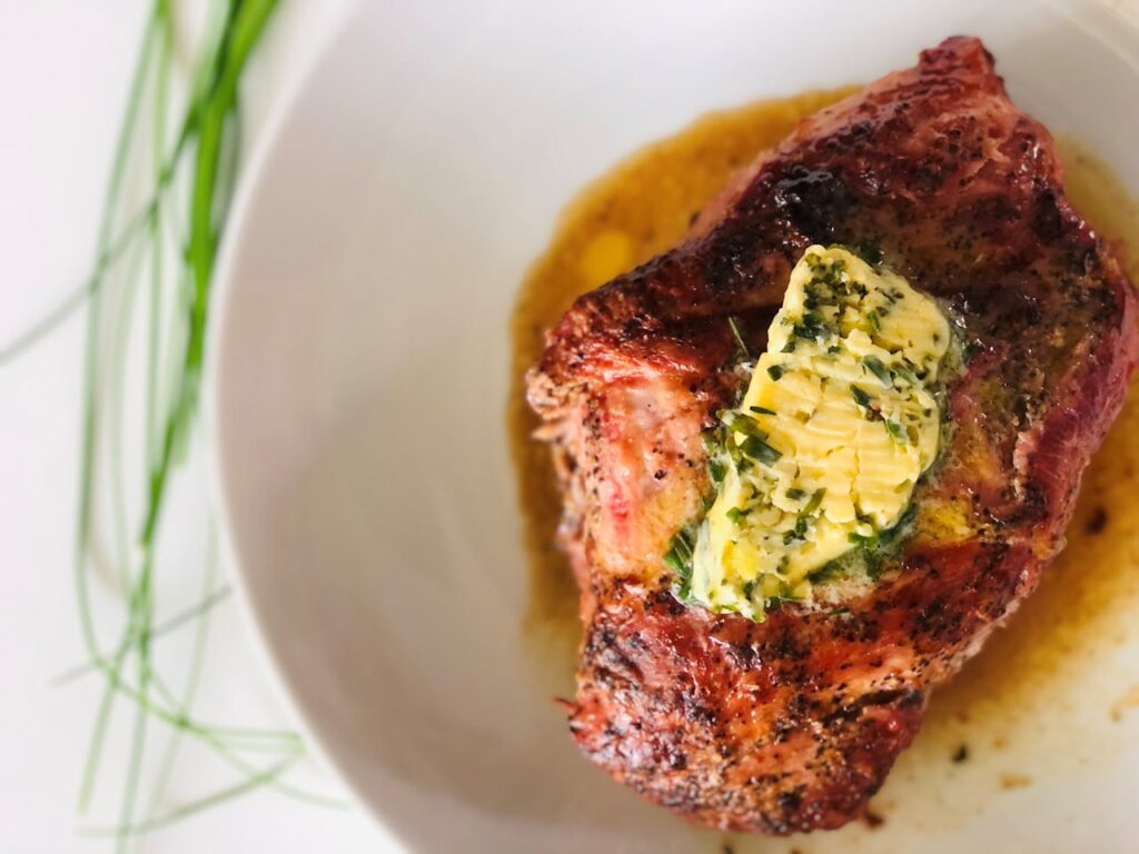 A Mouthwatering Steak with Butter Topping