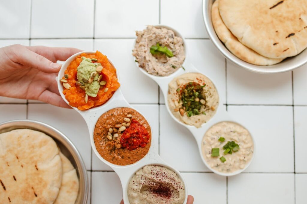 A Close-Up Shot of Various Dips