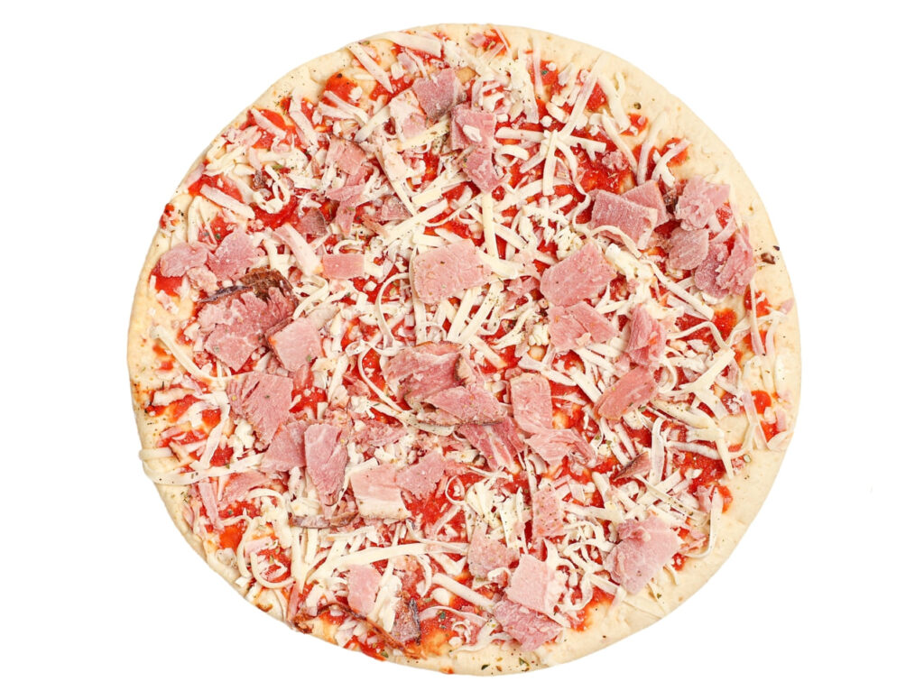 Whole frozen raw round pizza with smoked meat, mozzarella cheese and tomato sauce,
isolated on white background, close-up, top view